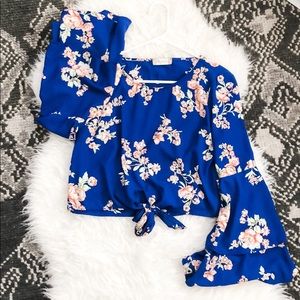 Blue floral blouse with bell sleeves